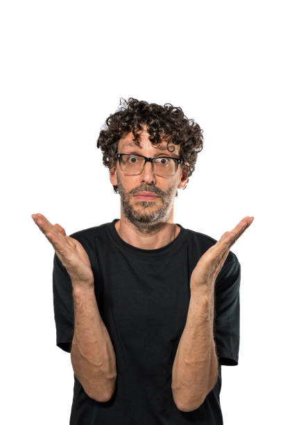 istock Middle-aged man expressing uncertainty with his hands, on white background. 1470050179