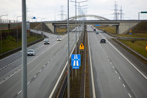 Gluchowo, Poland - February 2022 - Polish A2 motorway with cars and trucks.