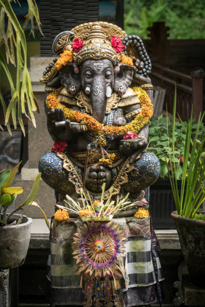 istock Ganesh Statue decorated with floweers in a temple in Ubud, Bali, Indonesia. 1470051305