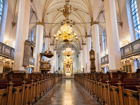 Long exposure shot of the Church of Our Saviour interior after service, Copenhagen, Denmark