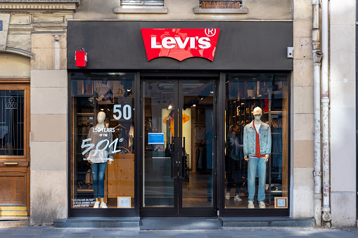 Paris, France - February 27, 2023: Exterior view of a Levi's store. Levi Strauss and co is an American clothing company  known in the whole world for its famous blue jeans