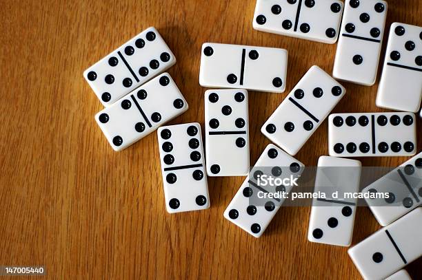 Table Of Dominos Stock Photo - Download Image Now - Domino, Leisure Games, Wood - Material