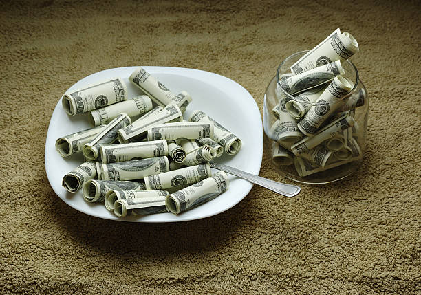 istock money on the plate 147006057