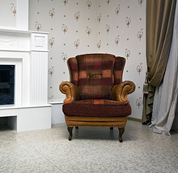 istock Chair near a fireplace 147006075