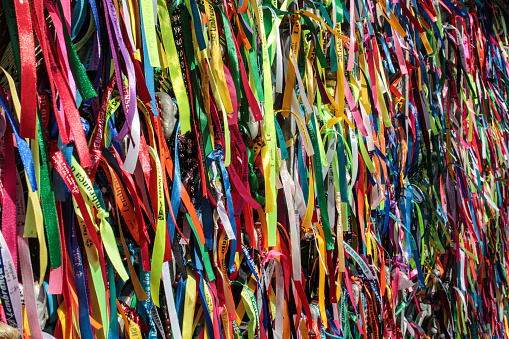 Colored ribbons tied to the railing of the Basilica of Nossa Senhora de Nazaré, in the city of Belém, Pará, Brazil.