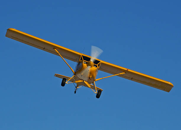 Bush plane on wheels My husbands homebuilt aircraft, a Murphy Rebel. It has just been put back on wheels from floats. bush plane stock pictures, royalty-free photos & images