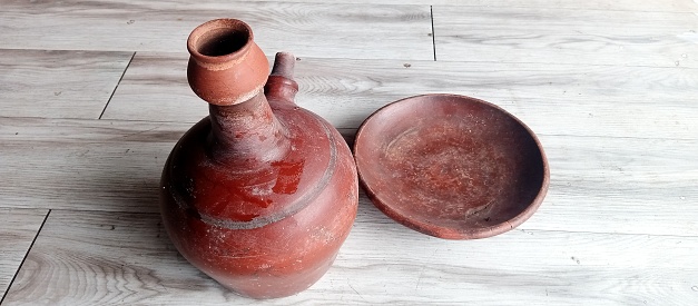 photo illustration of an earthenware jug, a place to store traditional drinking