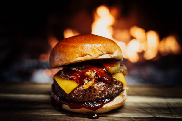 istock Cheeseburger on a wooden table 1470071758