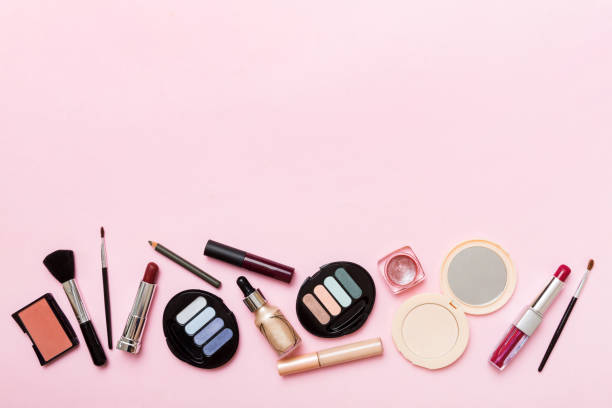 istock Professional makeup tools. Top view. Flat lay. Beauty, decorative cosmetics. Makeup brushes set and color eyeshadow palette on table background. Minimalistic style 1470075186