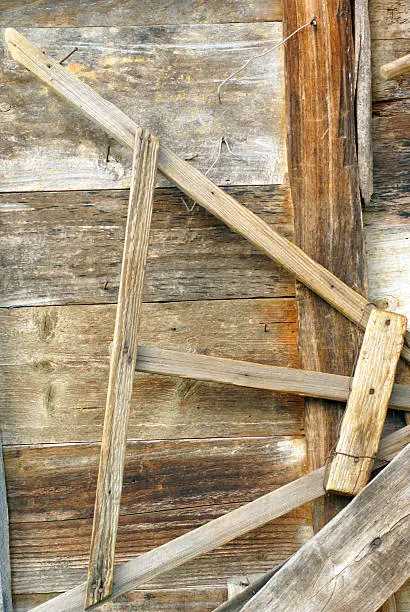 Wooden tools on a barn wall still nature