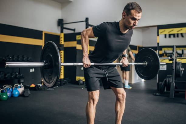 istock Strong man weightlifting in gym 1470079094