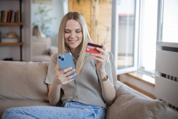 istock Happy young customer enjoys shopping online 1470083705