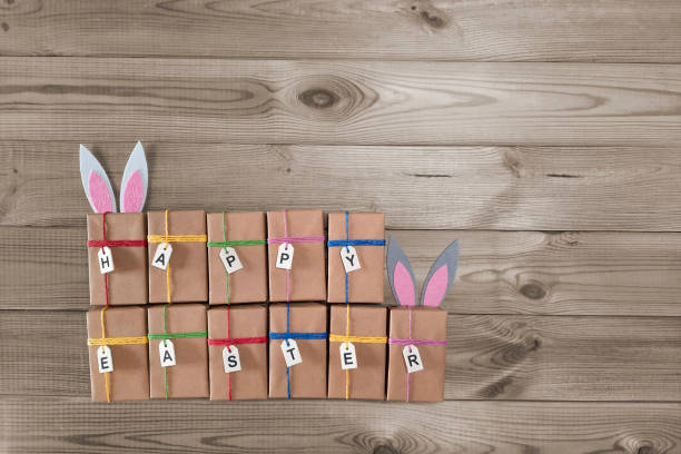 istock Easter gift boxes with bunny ears. Copy space. Top view. Template for advert fairs, sales. 1470084565