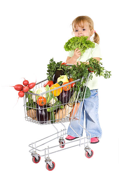 istock Little girl shopping for vegetables 147008479