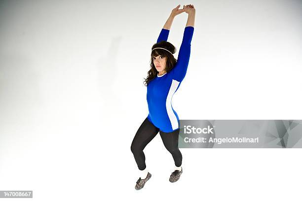 Girl Stretching Stock Photo - Download Image Now - Adult, Exercising, Horizontal