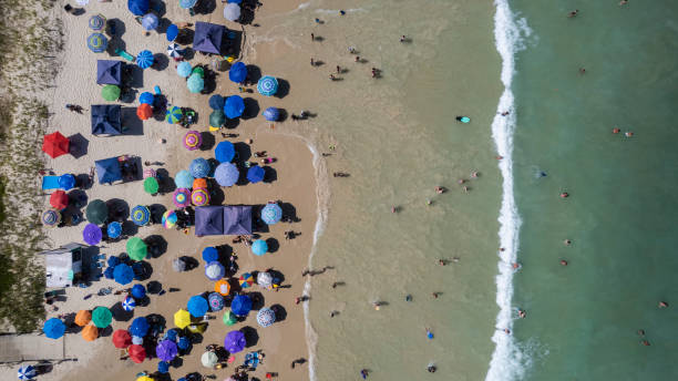 istock Beach with green waters with umbrellas 1470093680