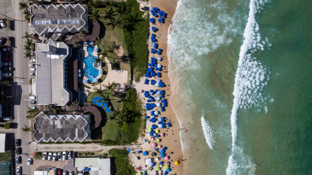 istock Beach with green waters with umbrellas 1470093698