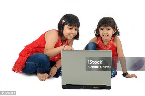 Girls At A Laptop Stock Photo - Download Image Now - Bracelet, Child, Curly Hair