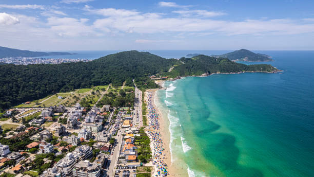 istock Beach with green waters with umbrellas 1470094620