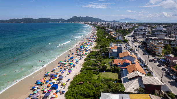 istock Beach with green waters with umbrellas 1470094642