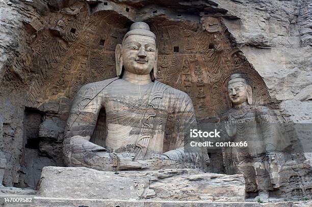 Foto de Escultura De Pedra De Buda Em As Grutas De Yungang e mais fotos de stock de Arqueologia - Arqueologia, Buda, Cultura Chinesa