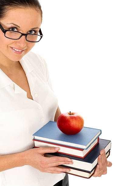istock Woman holding books and apple 147009667