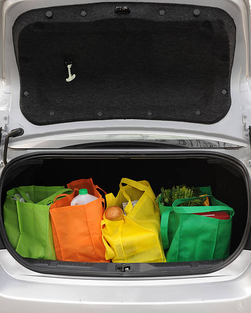 Shopping bags in the boot of a car stock photo