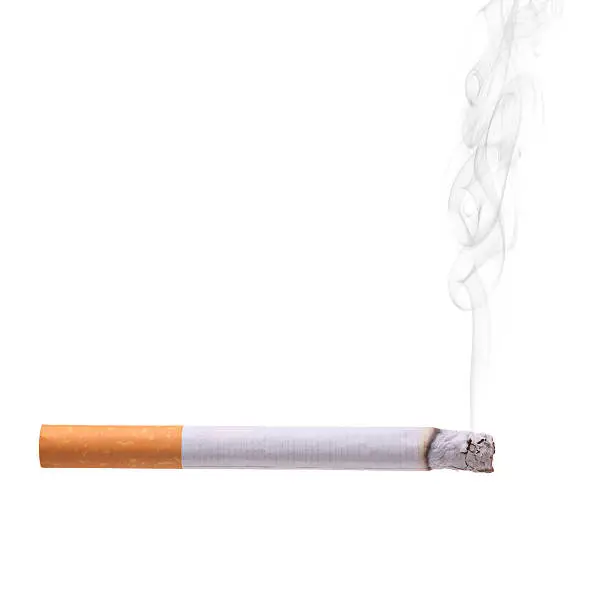 Photo of A lit cigarette on a white background 