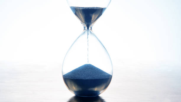 istock hourglass on a light background. time and minute measurement 1470113869