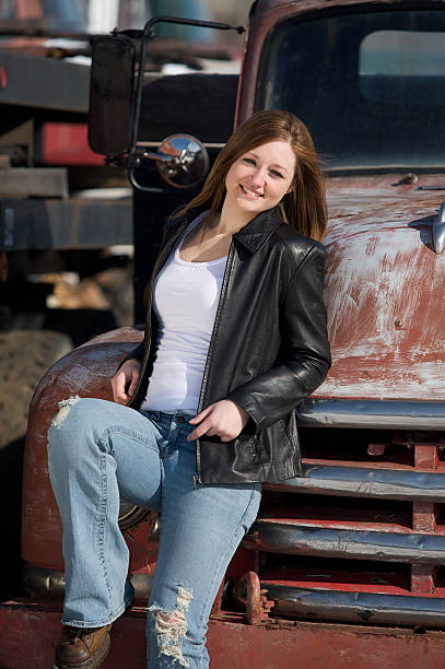 istock Young Woman Old Truck 147011401