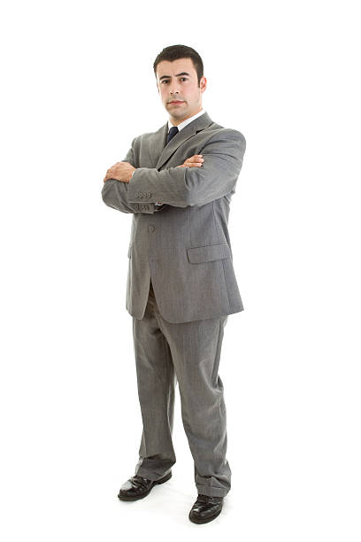 istock Confident Hispanic Man Standing with Arms Crossed 147011656