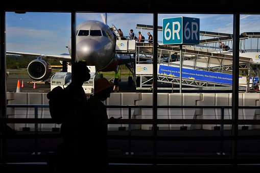 Narita, Japan - September 18, 2023 : People at the Narita International Airport in Japan. Narita International Airport is an international airport serving the Greater Tokyo Area.