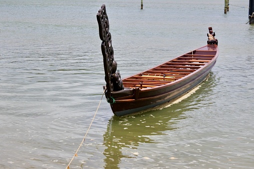 WaitangiI, Nzl - JAN 25 2023:Waka Maori watercraft,usually canoes ranging in size from small unornamented canoes (waka tīwai) used for fishing and river travel to large, decorated war canoes (waka taua)
