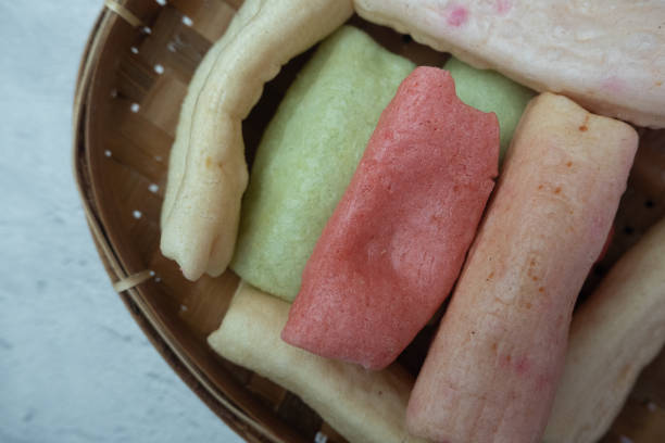 istock selective focus on colorful crackers on a bamboo plate, in Indonesian it is called kerupuk pelompong or krupuk pipa , soft focus 1470119961