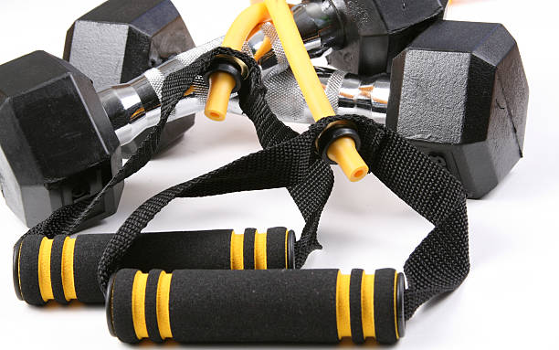 Dumbbells and bands stock photo