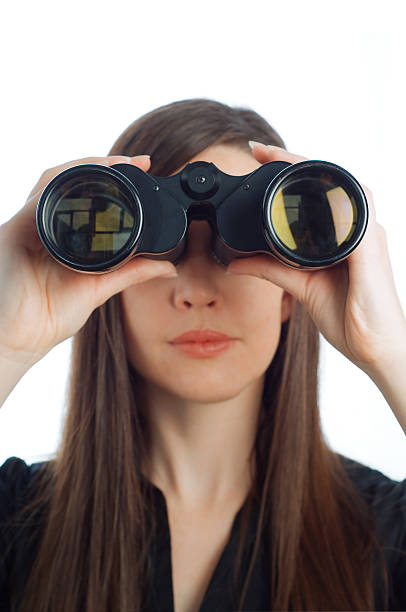 istock Business woman with binoculars 147012102