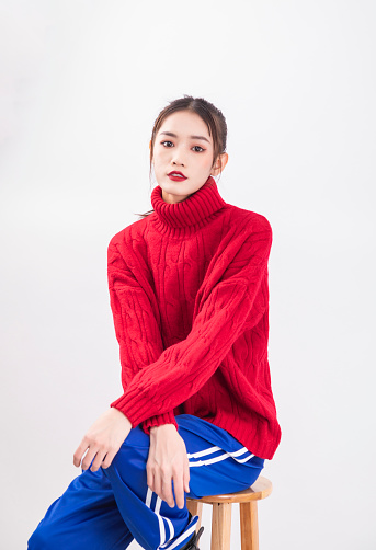 Beautiful woman in red sweater