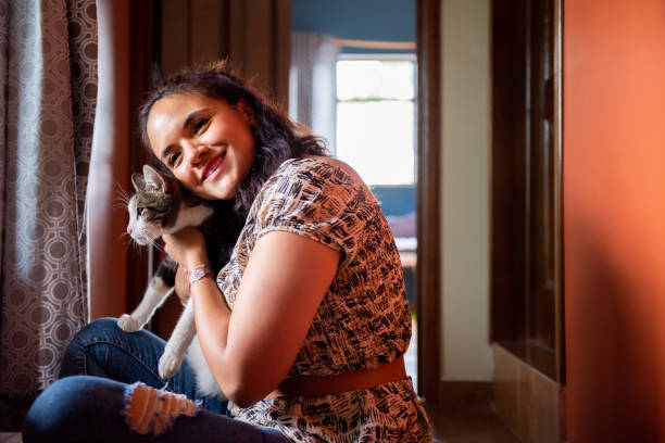 istock Woman having time with her cat in home 1470123630
