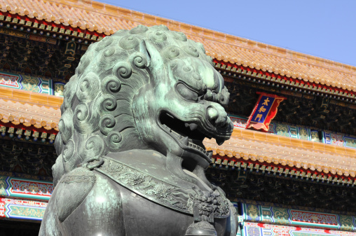 Royal Bronze Lion in front of the Imperial Palace in Beijing(Gu-gong as well-known in China). It not only is a majesty ornament of royalty but also is the symbol of economy and finance in the oriental culture. So lion's sculpture is often used in front of bank or government.