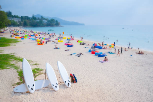 istock the beach in Phuket, Thailand.  focus at Surfers board 1470126880