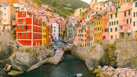 Beautiful landscape of a coastal fishing village, city of the Cinque Terre in Riomaggiore, Italy, Europe.Neighborhoood  concept.