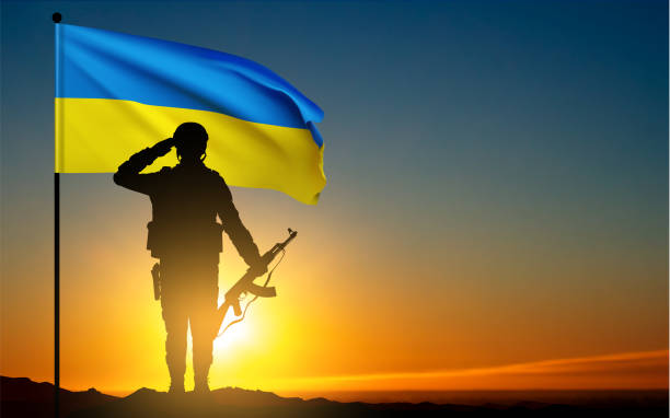istock Flag of Ukraine with silhouette of soldier 1470129772
