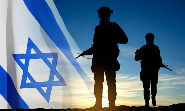 Vector illustration of Silhouette of soldiers with Israel flag against the sunrise