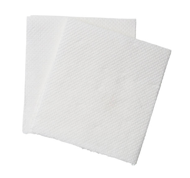 istock Two folded pieces of white tissue paper or napkin in stack isolated on white background with clipping path 1470134967