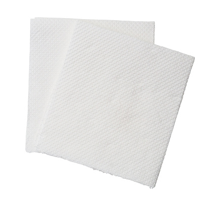 Two folded pieces of white tissue paper or napkin in stack are isolated on white background with clipping path.