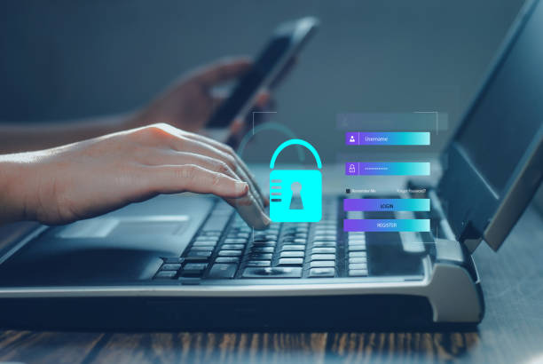 istock Cyber Security Internet and ​​Networking Concepts. businessman hand touch on screen icon and encrypt virtual lock screen icon. Digital technology safety crime protecting anonymous hackers' database 1470136174