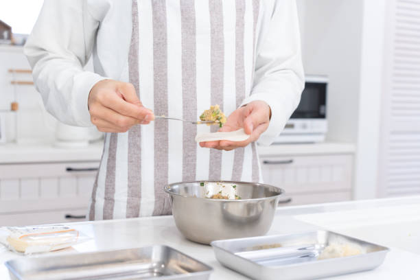 istock Man in his 40's cooking in the kitchen 1470138754