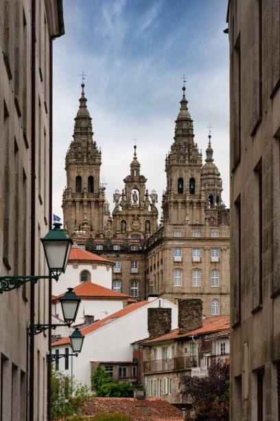 Santiago de Compostela Cathedral from Downtown Santiago de Compostela City Street View. Typical Downtown Buildings and Alley View towards the Santiago de Compostela Cathedral. Santiago de Compostela, Galicia, Spain, Europe