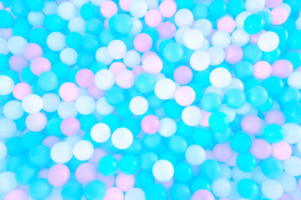 istock Multi-colored, highly saturated plastic balls under water, in a soft play ball pit. Colorful ball under water. 1470140898