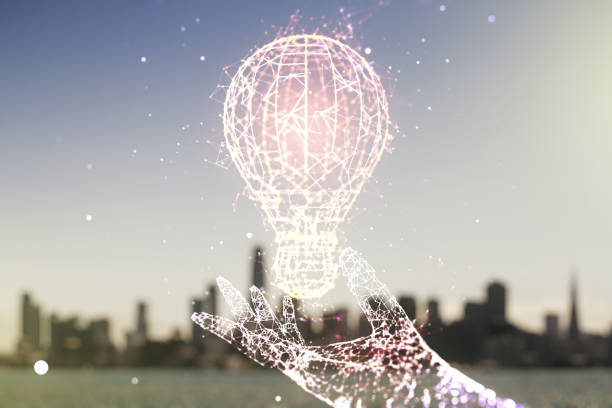 istock Abstract virtual light bulb illustration on blurry skyscrapers background, future technology concept. Multiexposure 1470141315